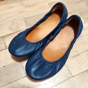 Navy blue Tieks ballet flats with packaging!